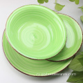 Индивидуальные цветные посуды посуды в руке керамическая посуда